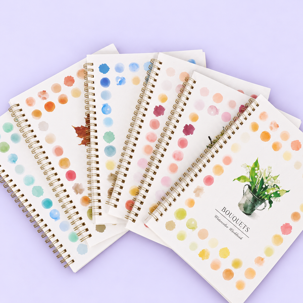 Spiral watercolour workbooks fanned out